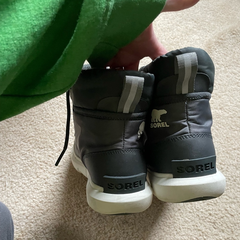 Sorel explorer insulated winter boots.